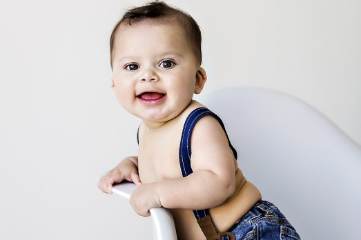 Baby Boy Pictures Jeans Suspenders Photographer Kansas City Childrens Photography Sitting Up Photos